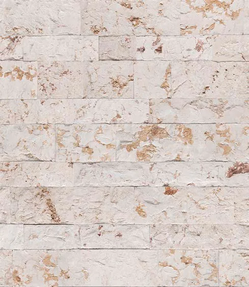 Rock-faced Cairo travertine strips in light tones with golden veins